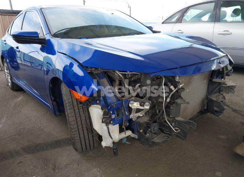 Photo 6 of 2018 Honda Civic LX (VIN 2HGFC2F51JH558860)