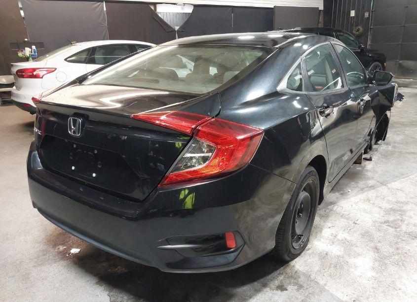 Photo 4 of 2018 Honda Civic LX (VIN 2HGFC2F51JH575531)