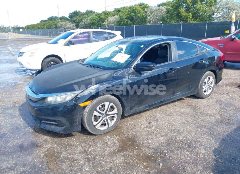 Photo 2 of 2018 Honda Civic LX (VIN 2HGFC2F51JH582009)