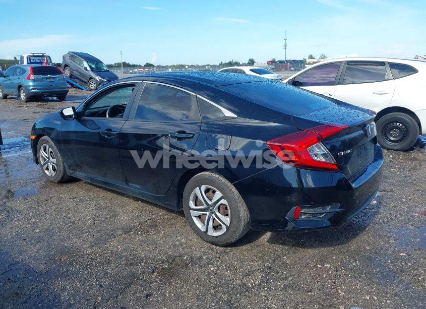 Photo 3 of 2018 Honda Civic LX (VIN 2HGFC2F51JH582009)