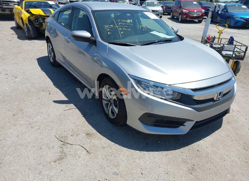 2018 Honda Civic LX (VIN 2HGFC2F51JH587288) main photo