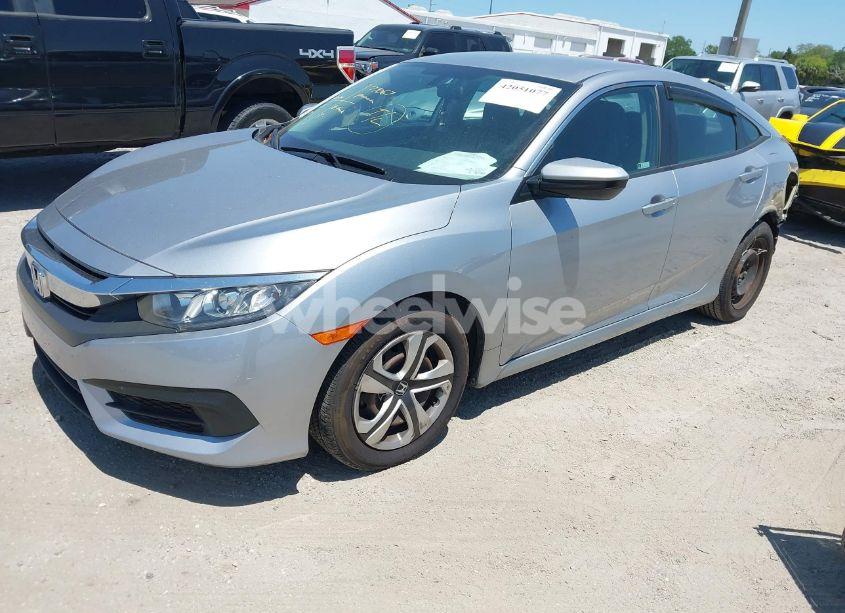 Photo 2 of 2018 Honda Civic LX (VIN 2HGFC2F51JH587288)