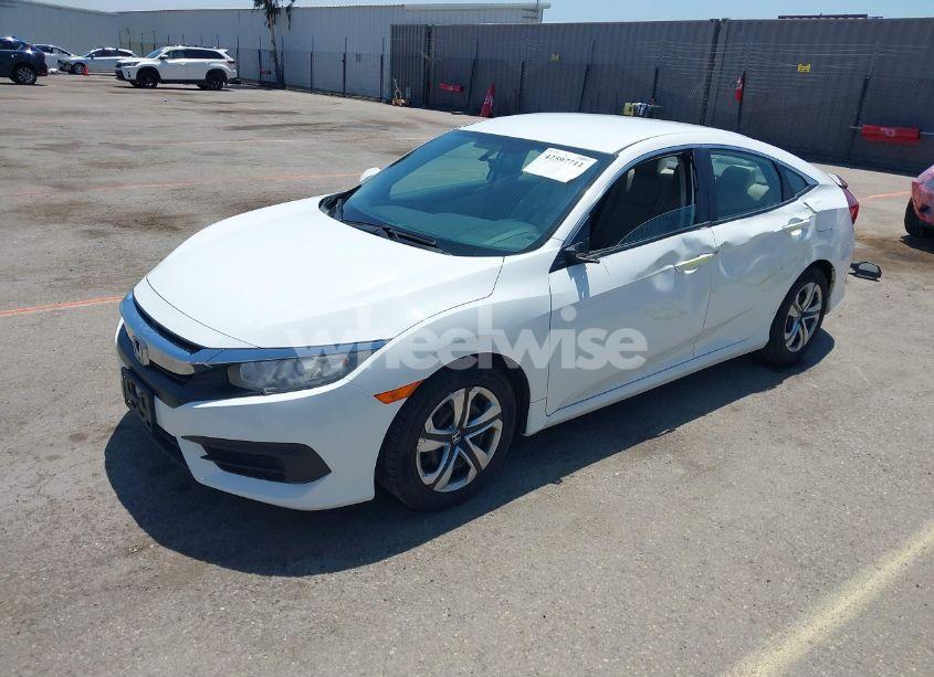 Photo 2 of 2017 Honda Civic LX (VIN 2HGFC2F52HH508057)
