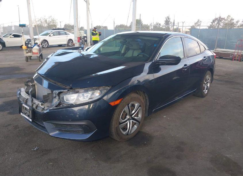 Photo 2 of 2017 Honda Civic LX (VIN 2HGFC2F52HH509029)