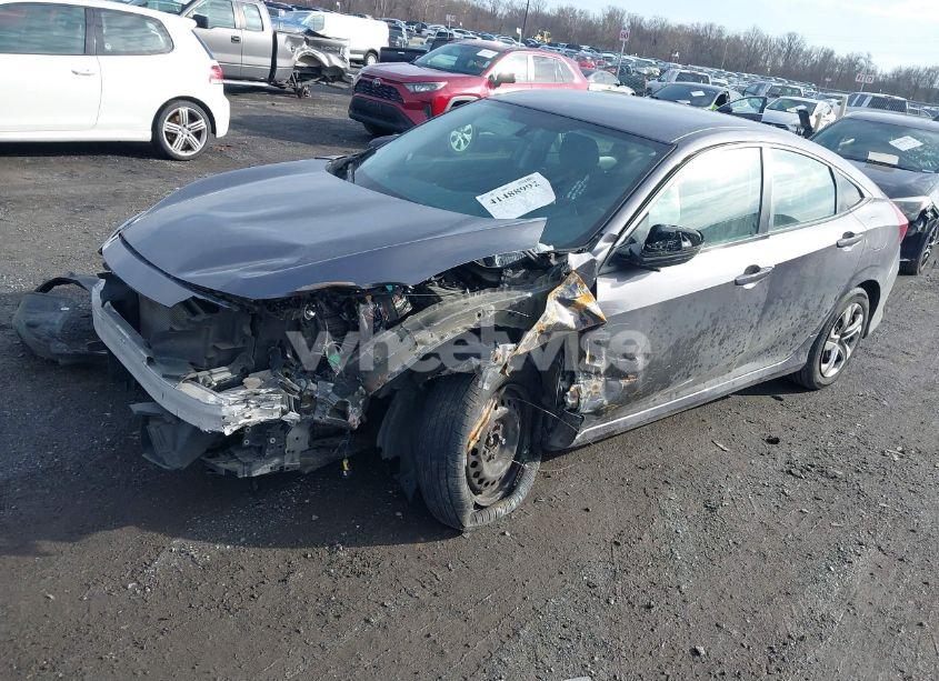 Photo 2 of 2017 Honda Civic LX (VIN 2HGFC2F52HH544458)