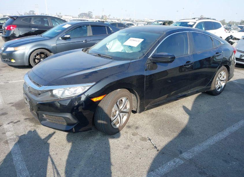 Photo 2 of 2018 Honda Civic LX (VIN 2HGFC2F52JH530579)