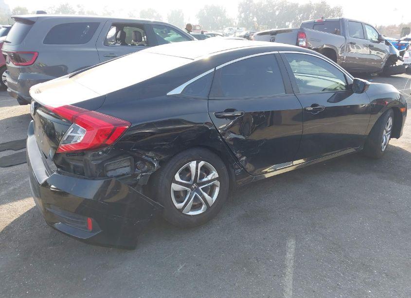 Photo 4 of 2018 Honda Civic LX (VIN 2HGFC2F52JH530579)