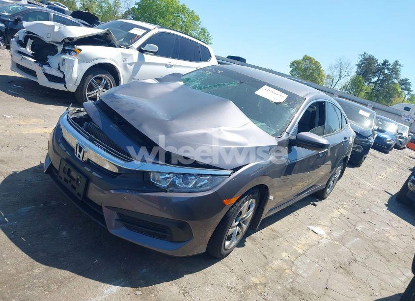 Photo 2 of 2018 Honda Civic LX (VIN 2HGFC2F52JH559113)
