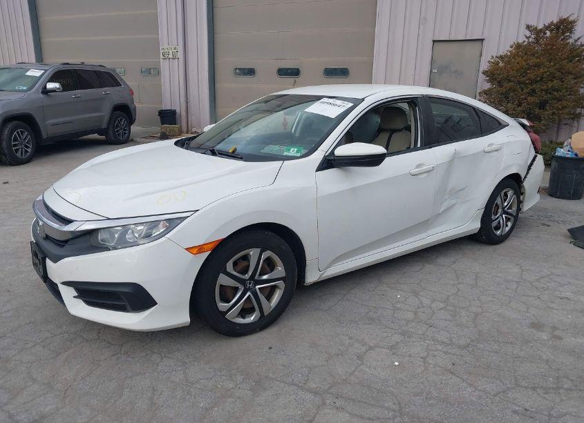 Photo 2 of 2018 Honda Civic LX (VIN 2HGFC2F52JH566479)