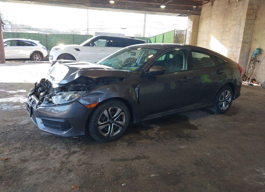 Photo 2 of 2018 Honda Civic LX (VIN 2HGFC2F52JH569107)