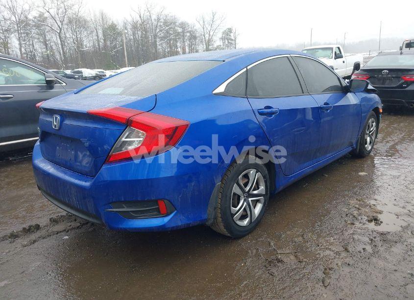 Photo 4 of 2018 Honda Civic LX (VIN 2HGFC2F52JH569866)