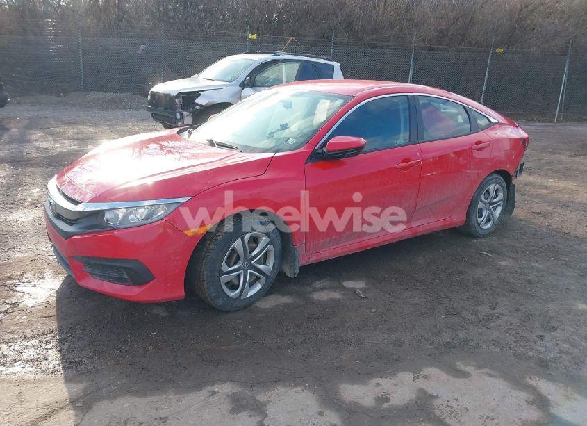 Photo 2 of 2018 Honda Civic LX (VIN 2HGFC2F52JH572475)