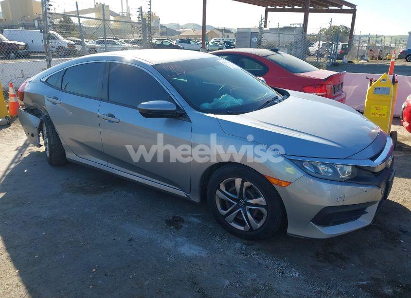 2018 Honda Civic LX (VIN 2HGFC2F52JH593875) main photo