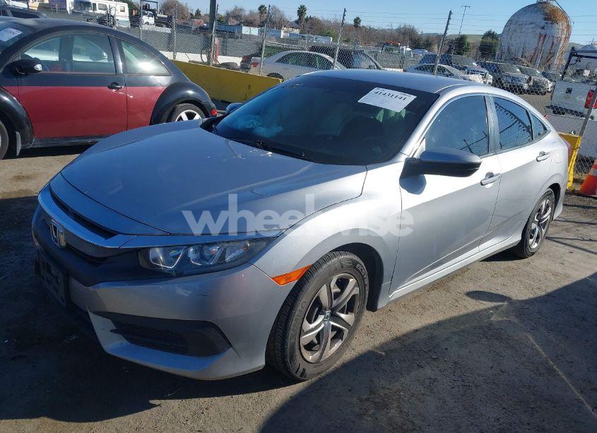 Photo 2 of 2018 Honda Civic LX (VIN 2HGFC2F52JH593875)