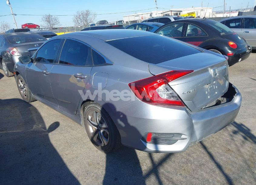 Photo 3 of 2018 Honda Civic LX (VIN 2HGFC2F52JH593875)