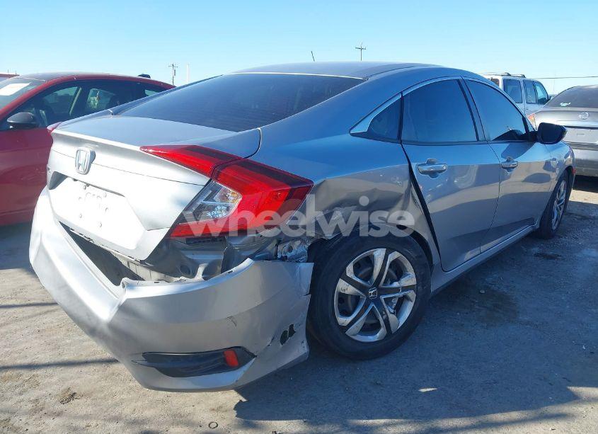 Photo 4 of 2018 Honda Civic LX (VIN 2HGFC2F52JH593875)