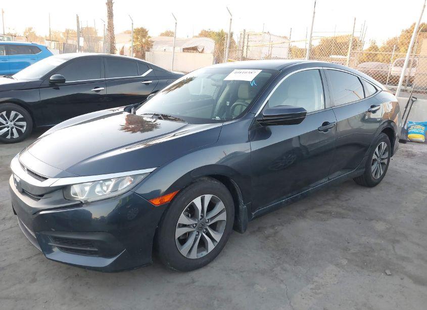 Photo 2 of 2017 Honda Civic LX (VIN 2HGFC2F53HH531735)