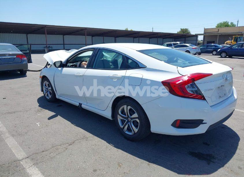 Photo 3 of 2017 Honda Civic LX (VIN 2HGFC2F53HH540628)