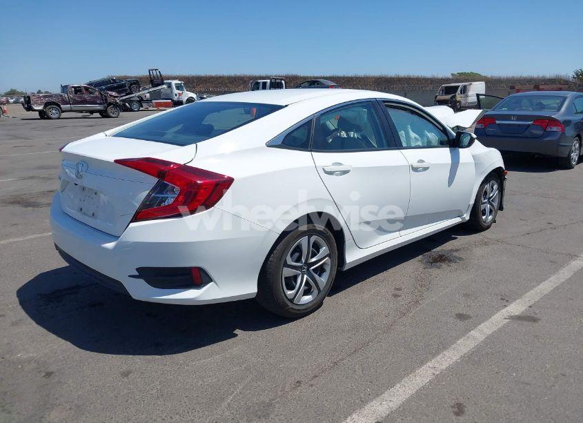 Photo 4 of 2017 Honda Civic LX (VIN 2HGFC2F53HH540628)