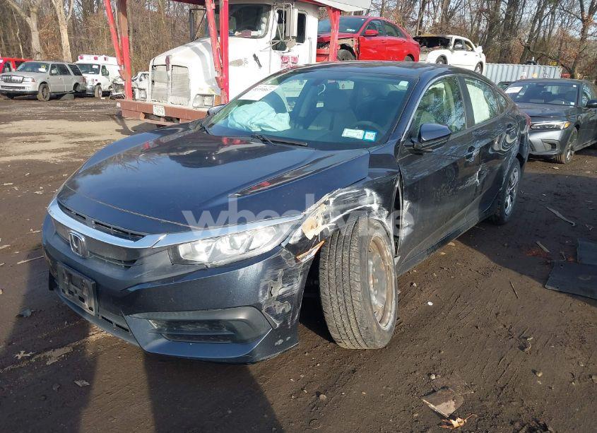 Photo 2 of 2017 Honda Civic LX (VIN 2HGFC2F53HH555369)
