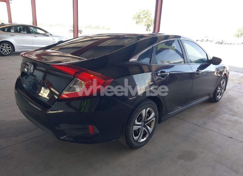 Photo 4 of 2018 Honda Civic LX (VIN 2HGFC2F53JH521860)