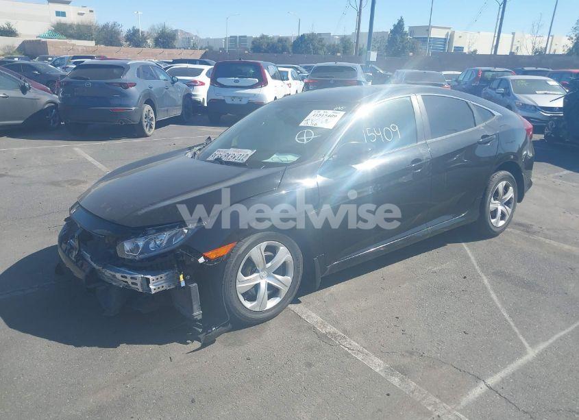 Photo 2 of 2018 Honda Civic LX (VIN 2HGFC2F53JH530798)