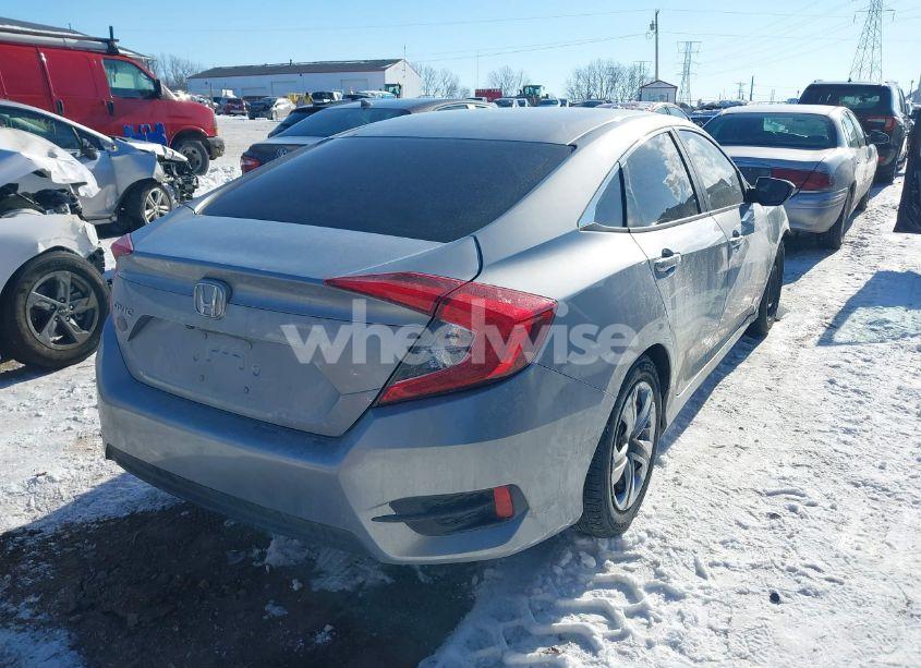 Photo 4 of 2018 Honda Civic LX (VIN 2HGFC2F53JH572954)