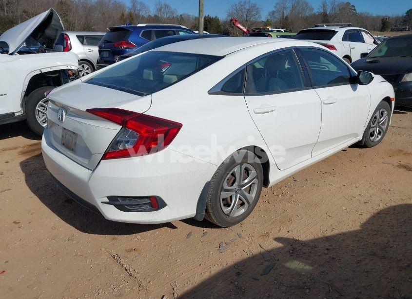 Photo 4 of 2018 Honda Civic LX (VIN 2HGFC2F53JH591181)