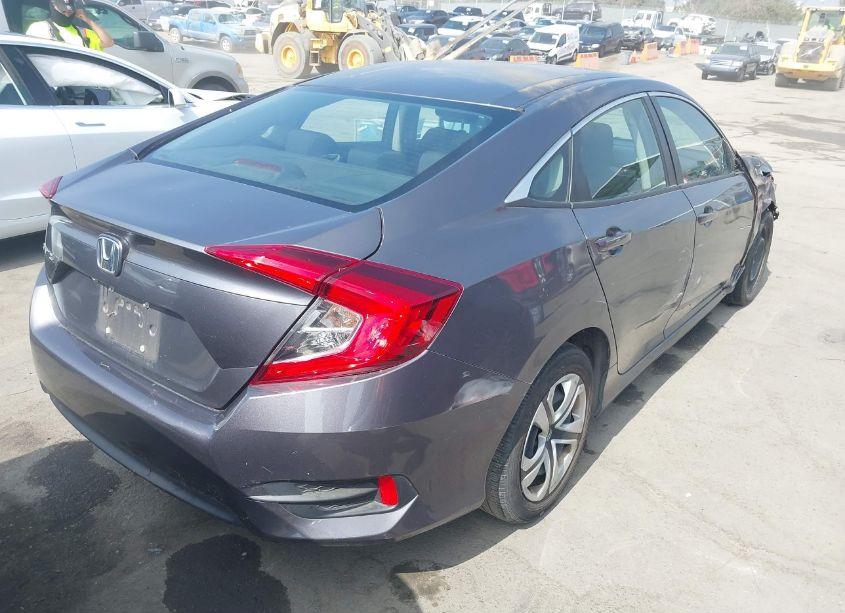 Photo 4 of 2018 Honda Civic LX (VIN 2HGFC2F53JH598499)