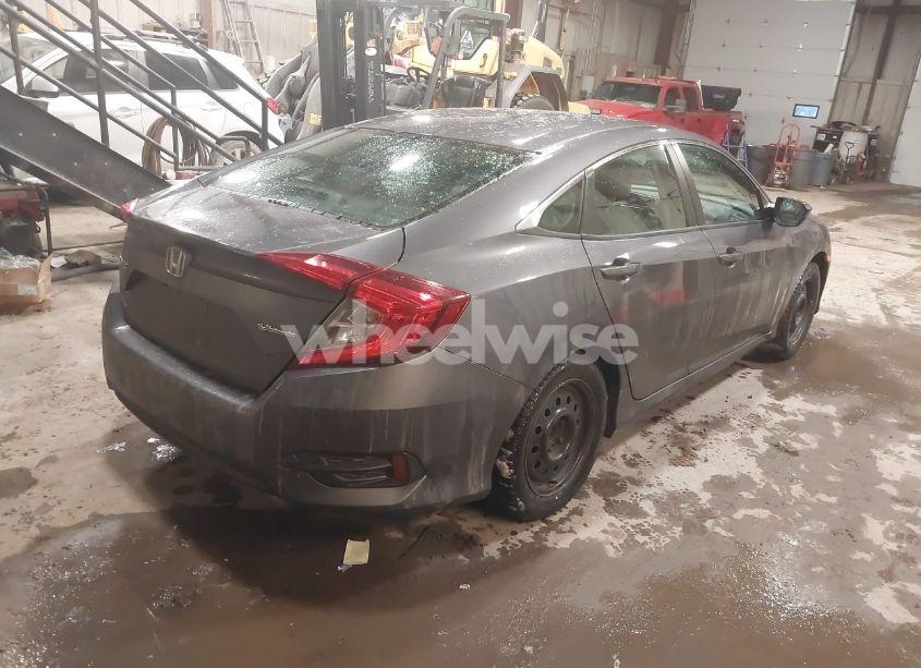Photo 4 of 2017 Honda Civic LX (VIN 2HGFC2F54HH541108)