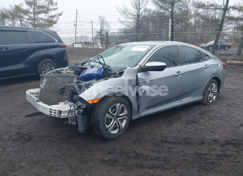 Photo 2 of 2018 Honda Civic LX (VIN 2HGFC2F54JH528199)
