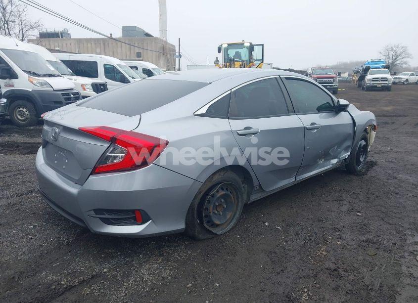 Photo 4 of 2018 Honda Civic LX (VIN 2HGFC2F54JH528199)