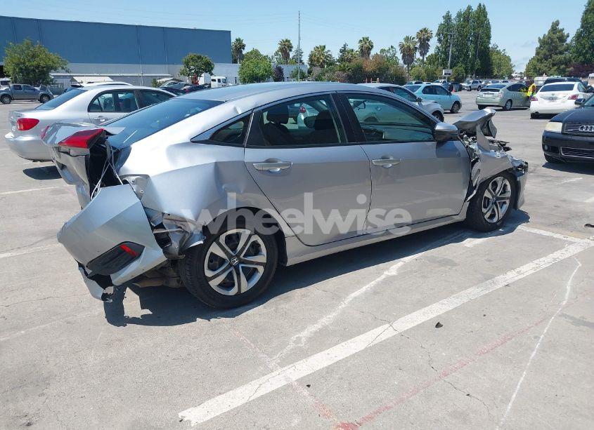 Photo 4 of 2018 Honda Civic LX (VIN 2HGFC2F54JH544662)