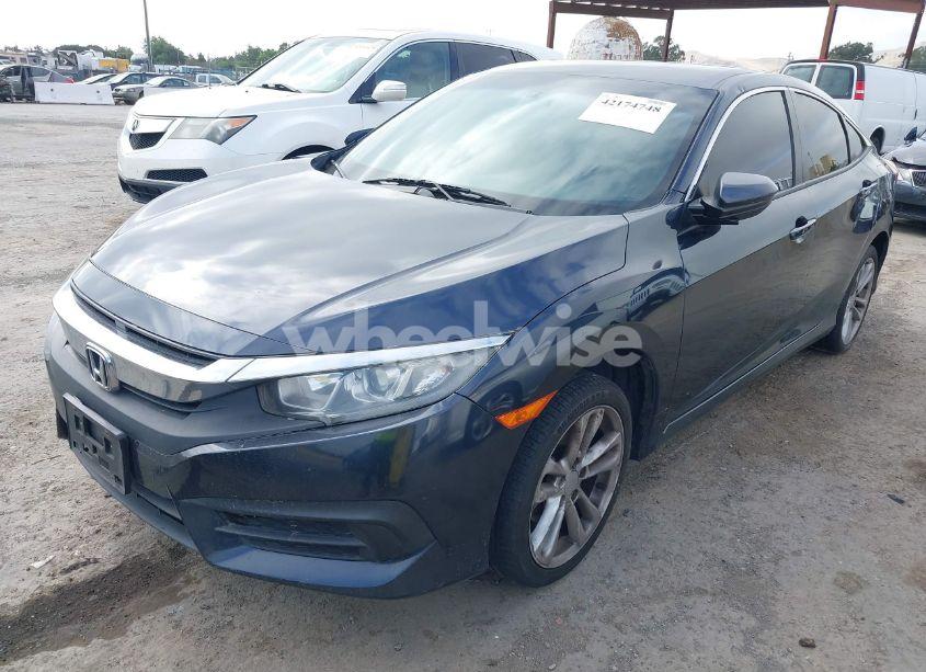 Photo 2 of 2018 Honda Civic LX (VIN 2HGFC2F54JH584949)