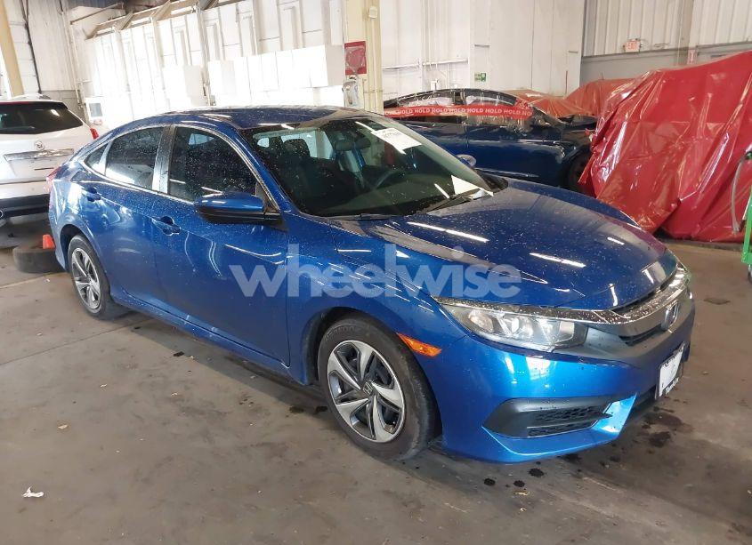 2018 Honda Civic LX (VIN 2HGFC2F54JH590542) main photo
