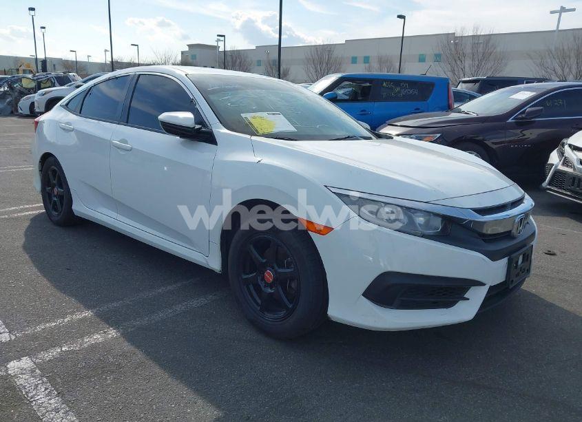 2018 Honda Civic LX (VIN 2HGFC2F54JH604309) main photo