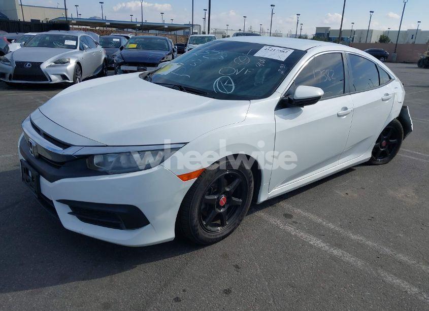 Photo 2 of 2018 Honda Civic LX (VIN 2HGFC2F54JH604309)