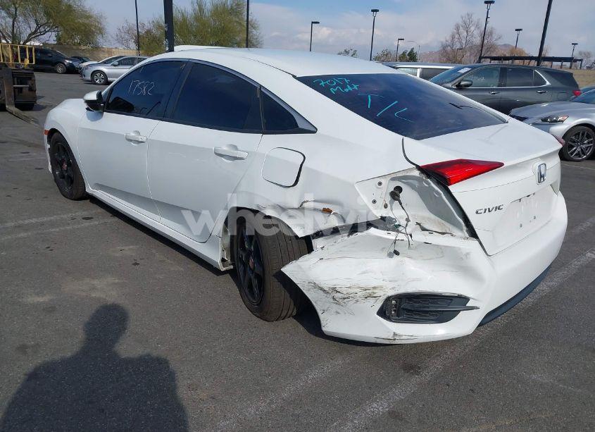 Photo 3 of 2018 Honda Civic LX (VIN 2HGFC2F54JH604309)