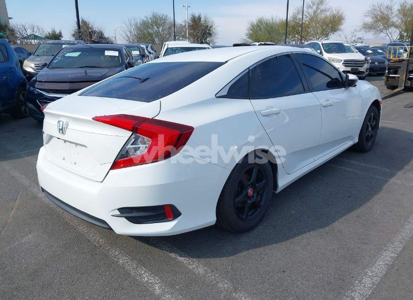 Photo 4 of 2018 Honda Civic LX (VIN 2HGFC2F54JH604309)