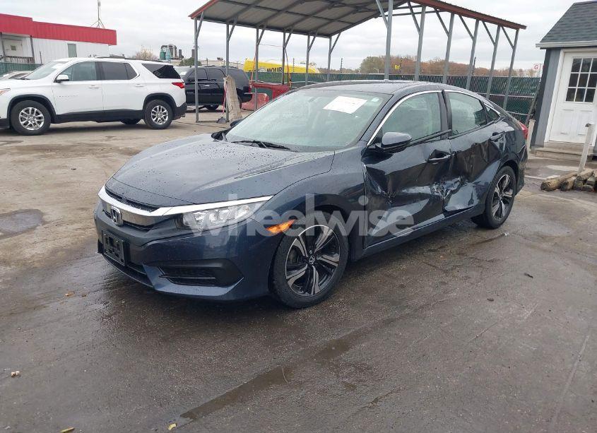 Photo 2 of 2018 Honda Civic LX (VIN 2HGFC2F54JH610143)