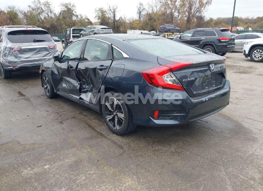 Photo 3 of 2018 Honda Civic LX (VIN 2HGFC2F54JH610143)
