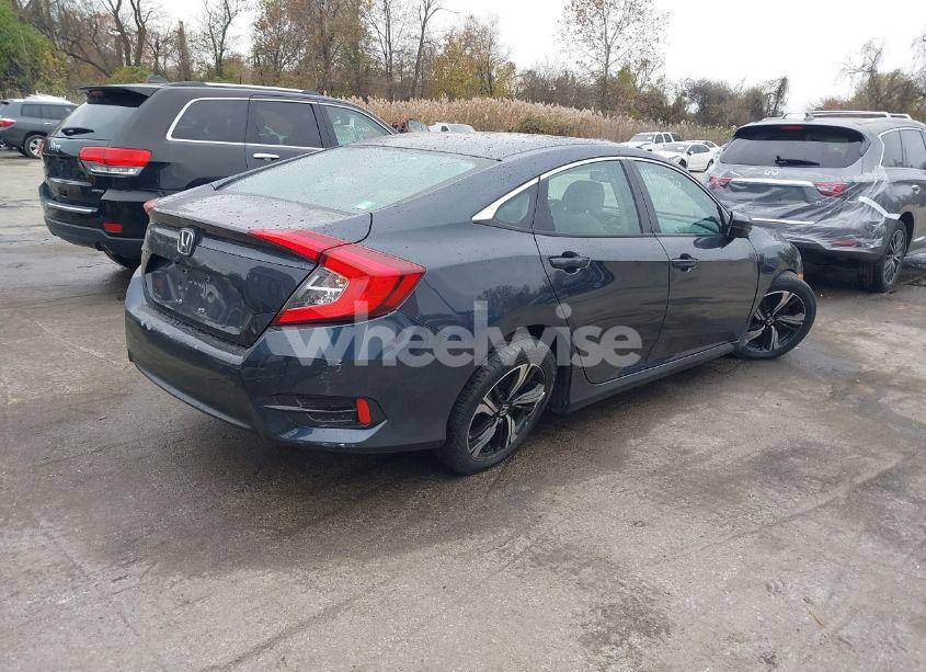 Photo 4 of 2018 Honda Civic LX (VIN 2HGFC2F54JH610143)