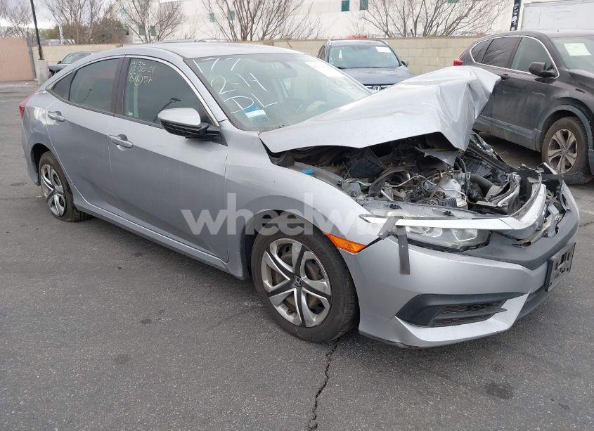 2018 Honda Civic LX (VIN 2HGFC2F54JH610823) main photo