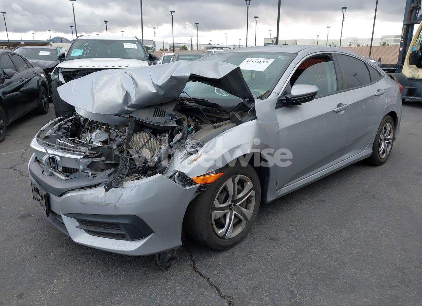 Photo 2 of 2018 Honda Civic LX (VIN 2HGFC2F54JH610823)