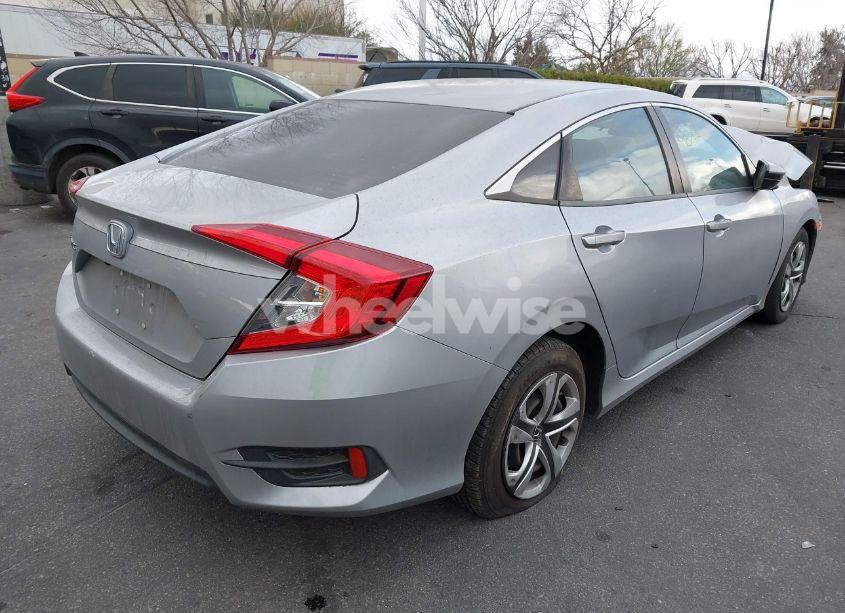 Photo 4 of 2018 Honda Civic LX (VIN 2HGFC2F54JH610823)