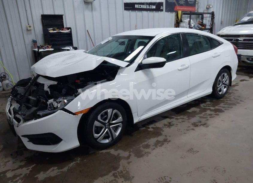 Photo 2 of 2016 Honda Civic LX (VIN 2HGFC2F55GH556277)