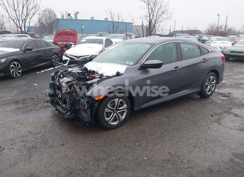 Photo 2 of 2018 Honda Civic LX (VIN 2HGFC2F55JH521178)