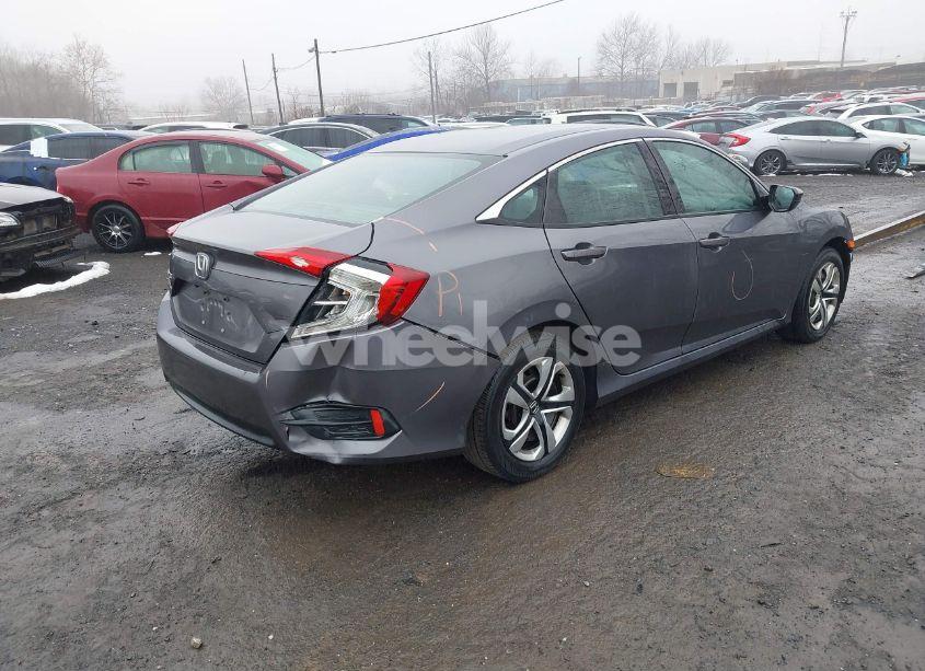 Photo 4 of 2018 Honda Civic LX (VIN 2HGFC2F55JH521178)