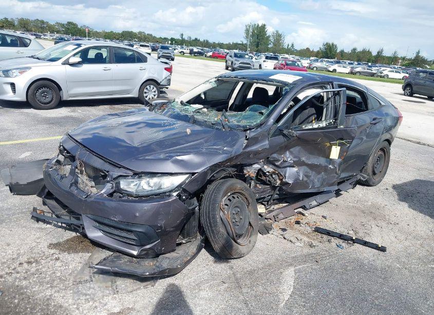 Photo 2 of 2018 Honda Civic LX (VIN 2HGFC2F55JH563821)