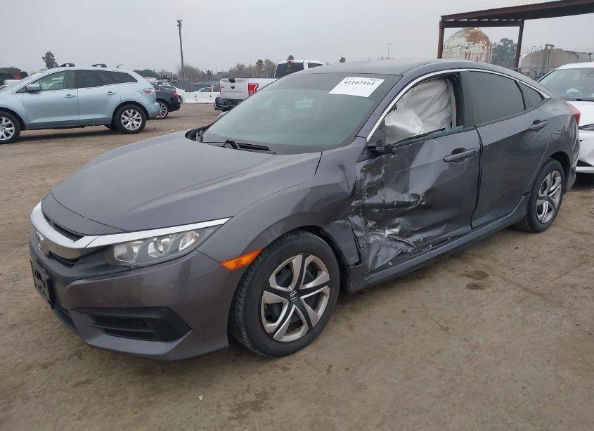 Photo 2 of 2018 Honda Civic LX (VIN 2HGFC2F55JH565164)